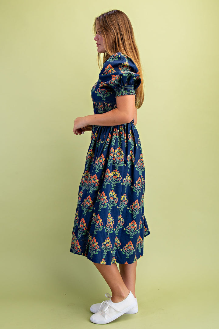 Women’s button front dress with colorful floral print