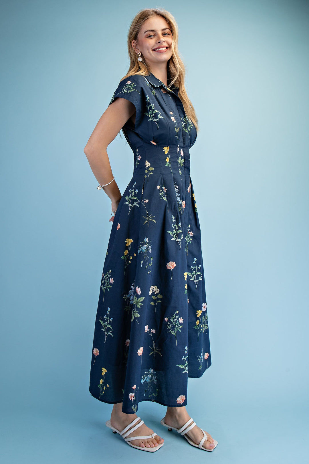 Women’s cap sleeve navy dress with fitted waist