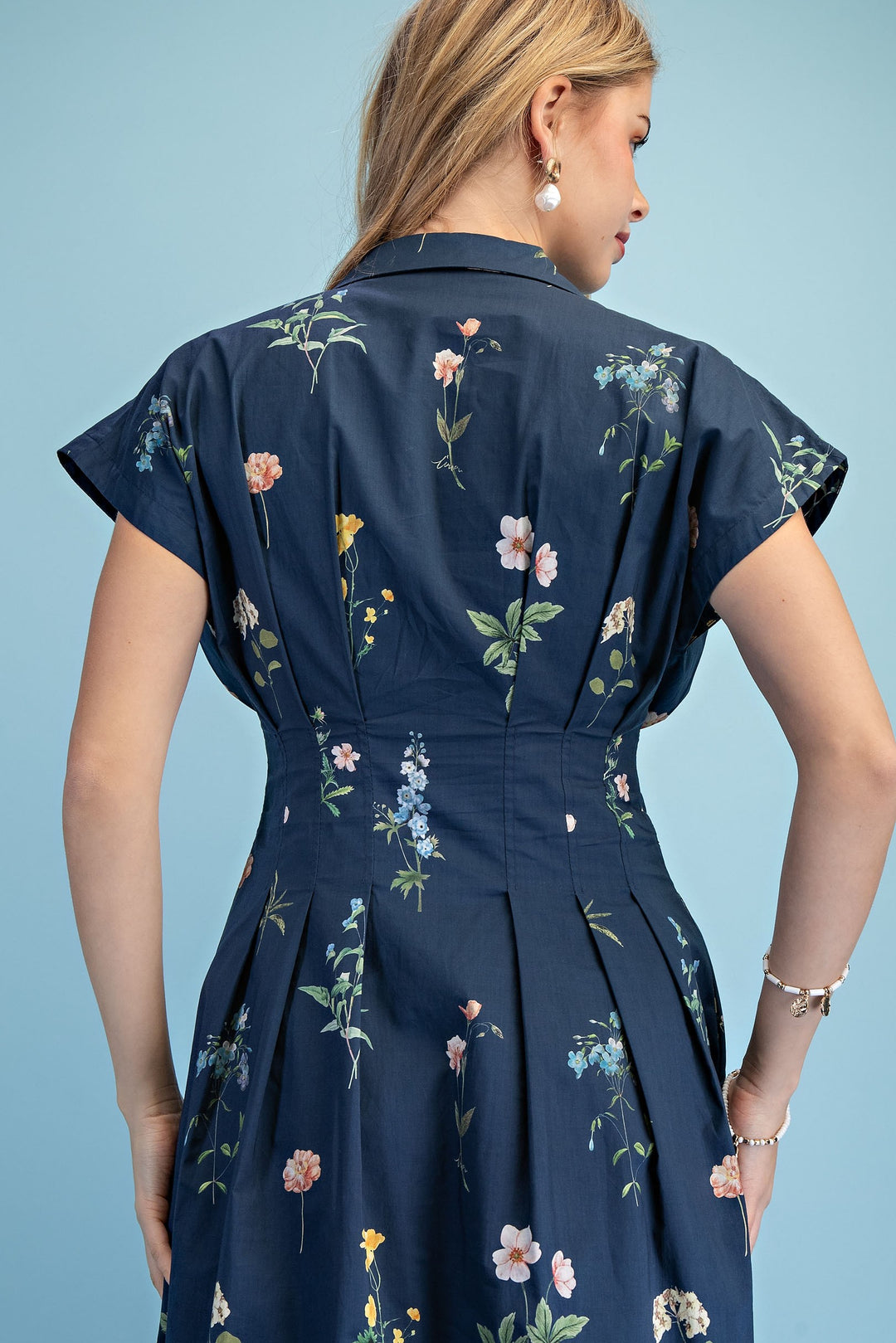 Elegant floral midi dress styled with sandals