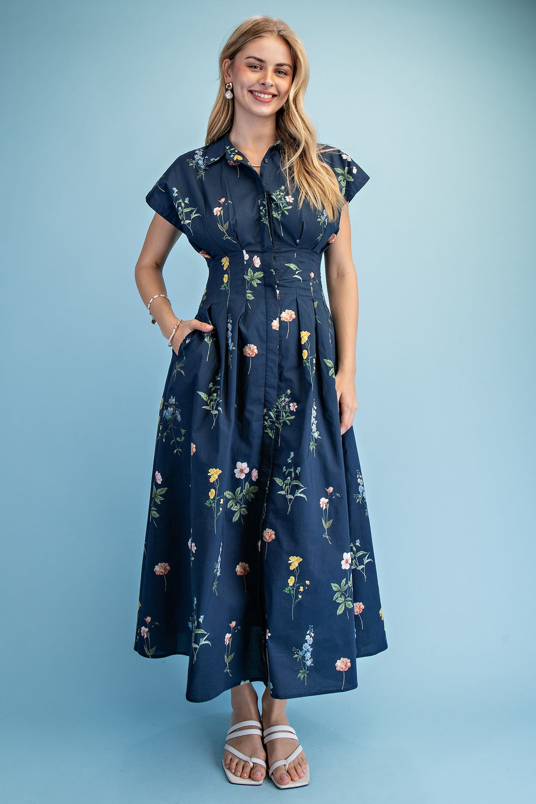 Navy floral midi dress with button front and pockets
