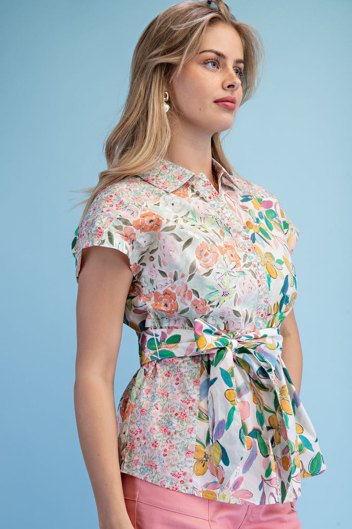 Lightweight multicolor floral blouse styled with pink pants