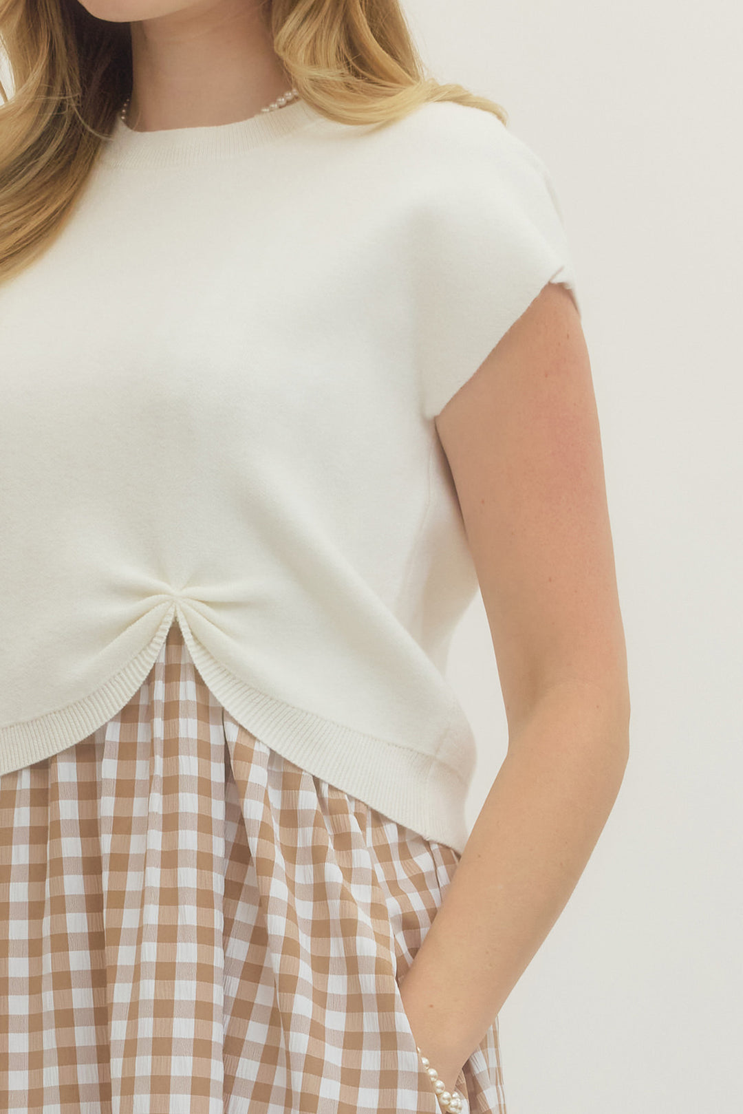 Neutral gingham dress worn with cropped knit top