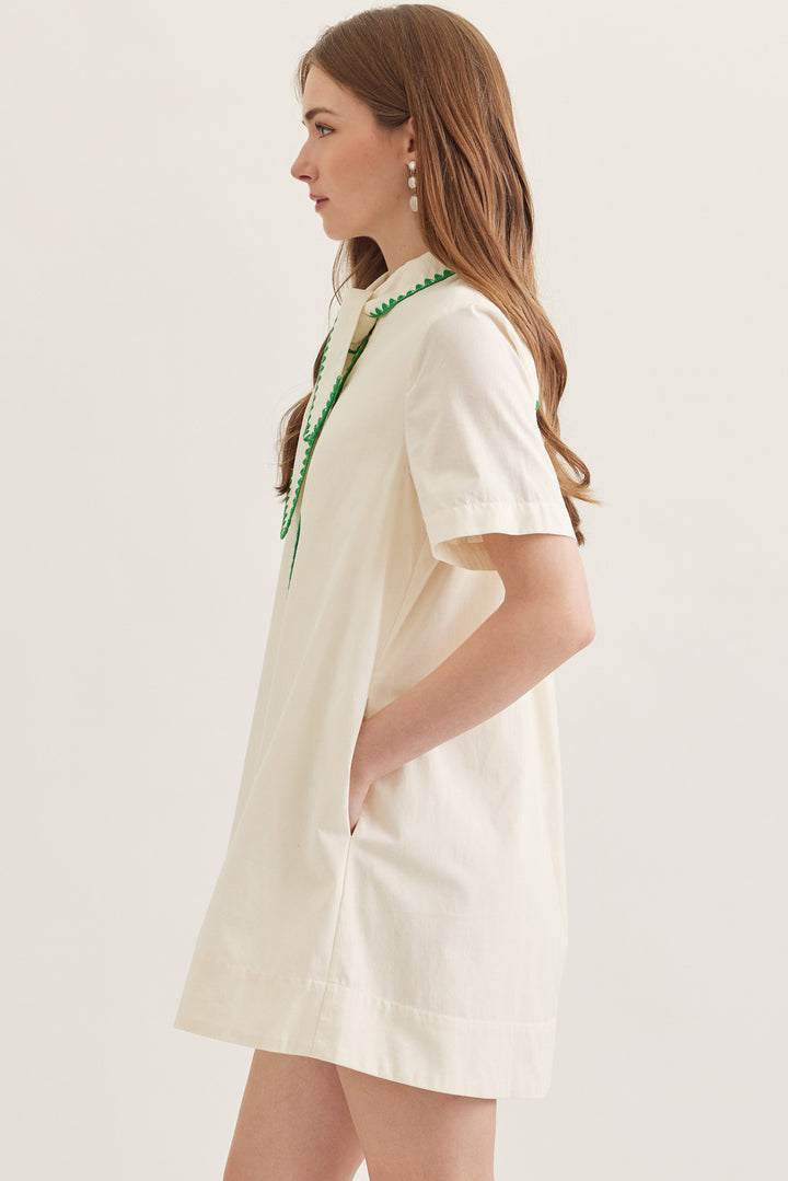 Lightweight shirt dress styled with minimal accessories