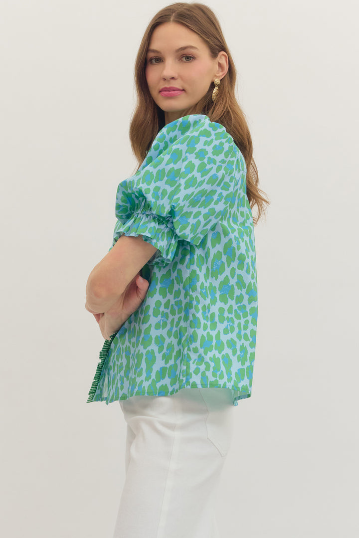 Women’s statement top with ruffle sleeves and button front