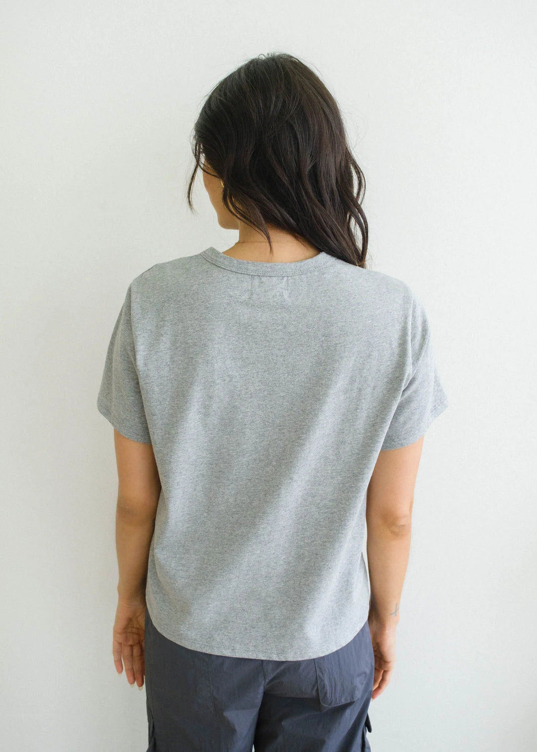 Casual grey short sleeve top styled with denim